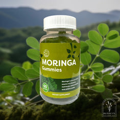 Bottle of Moringa Gummies with a natural green background