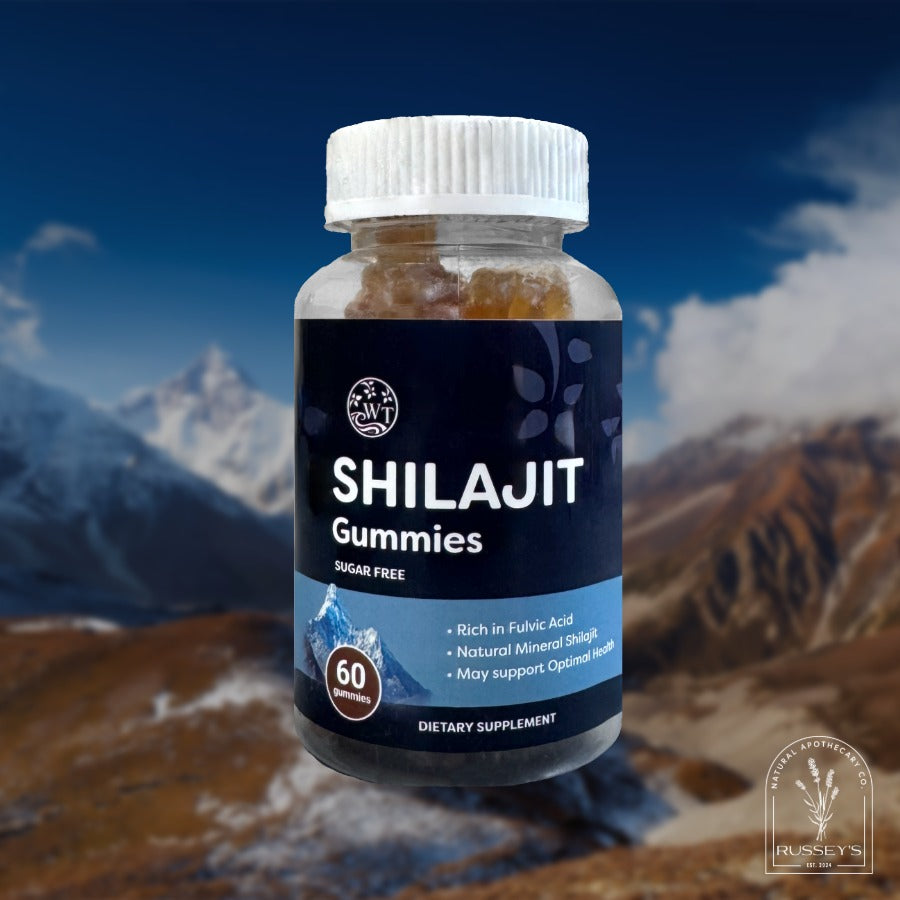 Bottle of Shilajit Gummies with a mountainous background