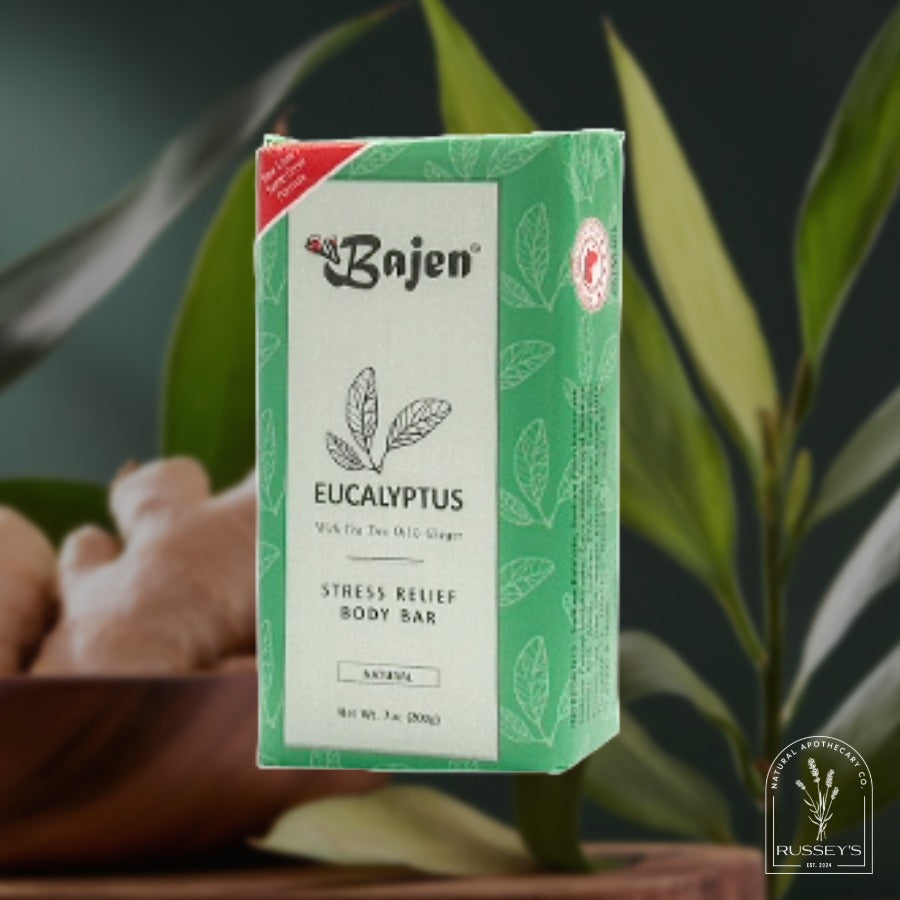 Bajen Eucalyptus stress relief body bar packaging with green leaves on a dark background