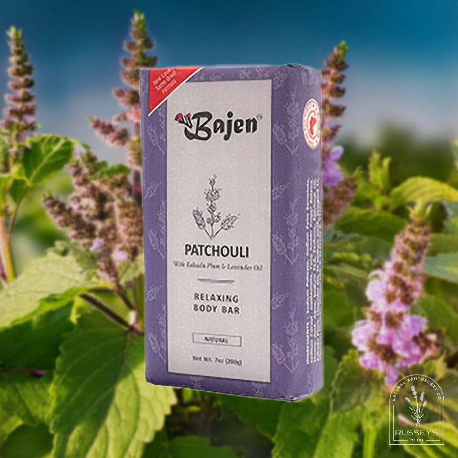 Bajen Patchouli body bar packaging with a natural background of plants and flowers