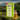 Bajen Tea Tree Purifying Body Bar packaging with a bottle of tea tree oil in the background.
